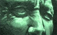 the cover of a book with a green face